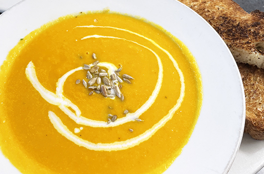 Vegan Carrot Ginger Soup, with Coconut Cream & Sunflower Seeds